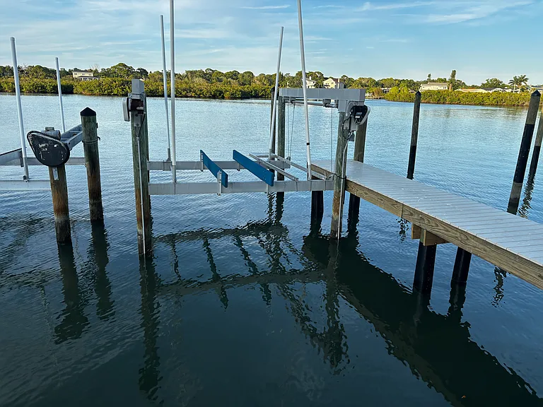 Private boat slip with automatic lift, electric and water hookup