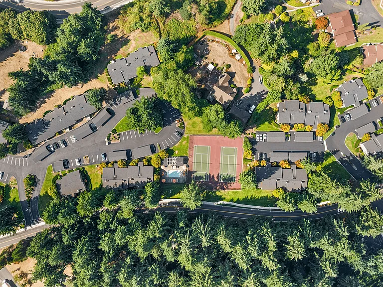 Resort-style amenities in a peaceful wooded setting.