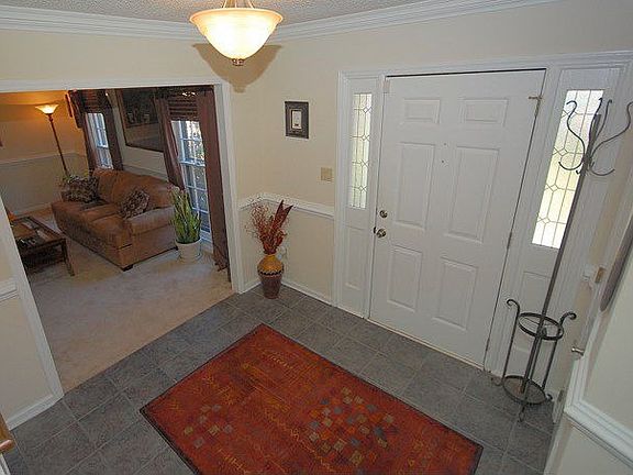 Welcoming Foyer with two closets & tile floor!