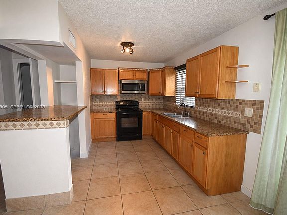 5th image of 7501 Kimberly Blvd APT 104