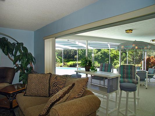 Living Rm. overlooks pool