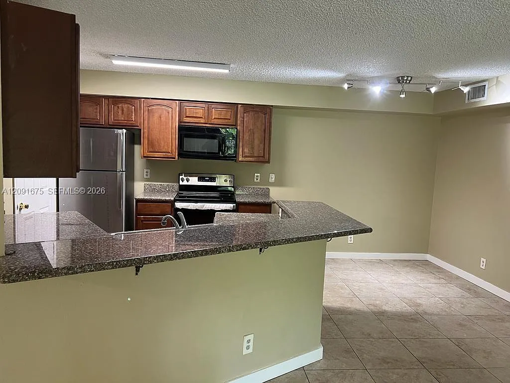 Summerbreeze Condo — Photo 3