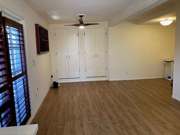 Living area with bed area to right