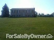Front of house
						:
						Yard total 3.12 acres