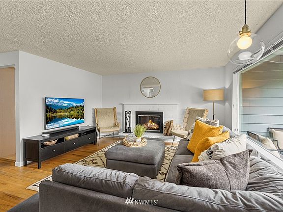 Original hardwood floors, memorable light fixtures, nicely sized spaces offering the comforts of home.