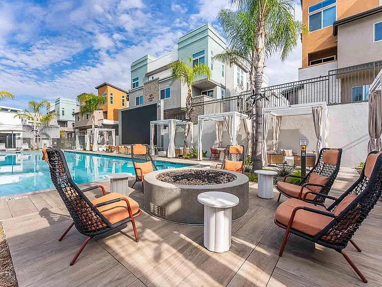 Poolside fire pit and cabanas