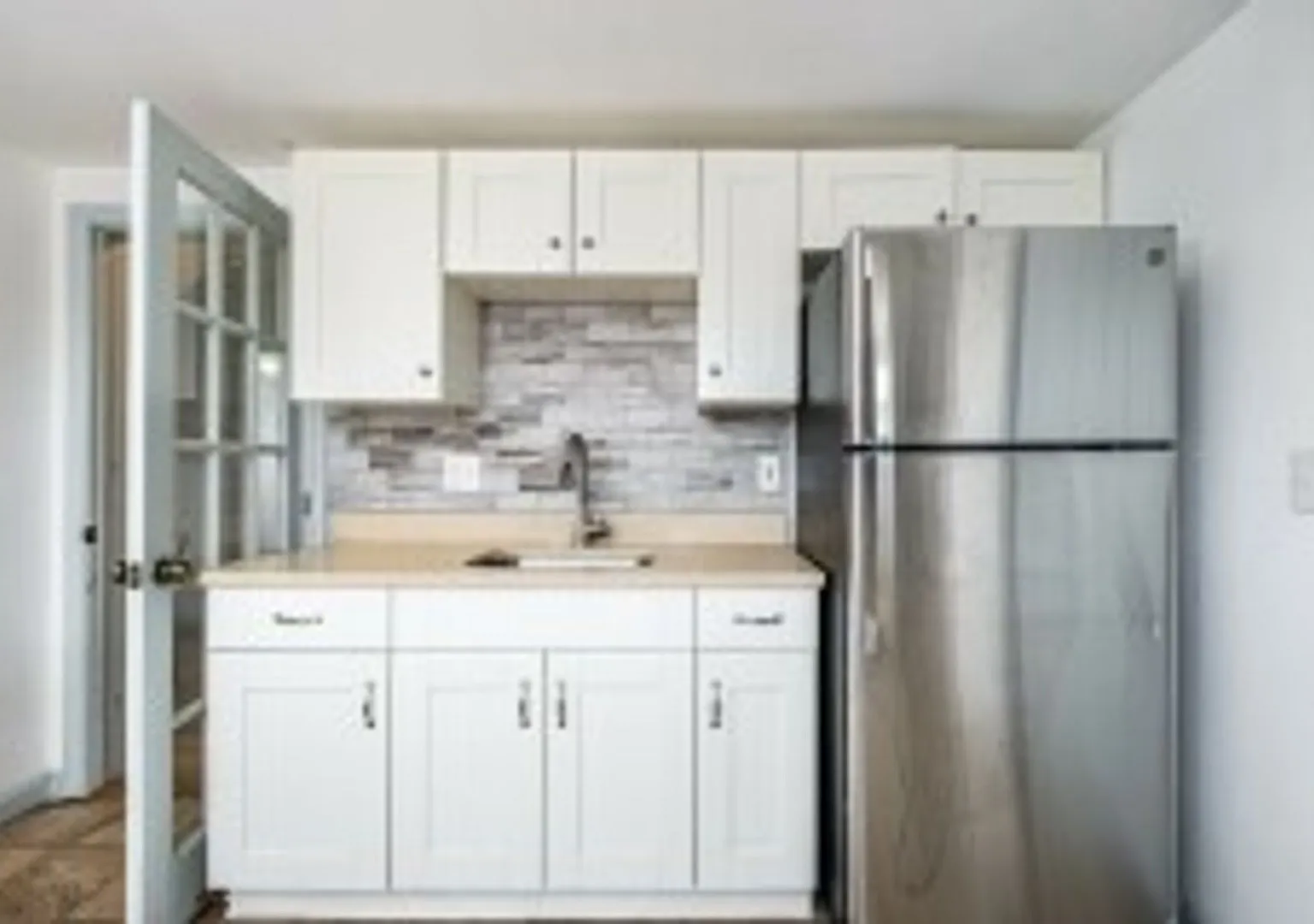 Renovated 4BR with In-Unit Laundry Near Moody Street — Photo 1