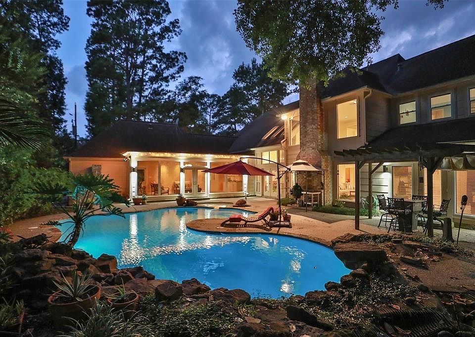 This Champion Forest estate home has it all; great location, charming curb appeal, quiet street, 5-bedrooms AND a backyard oasis. The resurfaced pool is low-maintenance saltwater complete w/lights, spa & stone surround. Saltwater pools are gentler on
