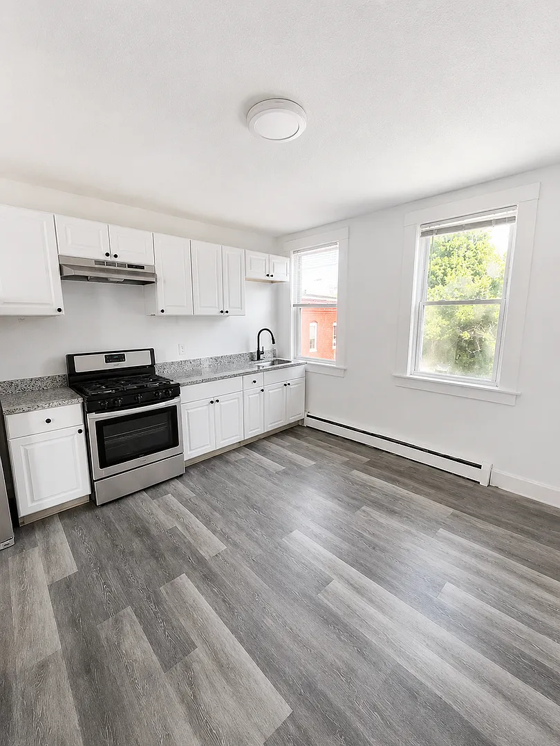 Updated 3-Bedroom Apartment For Rent — Photo 2