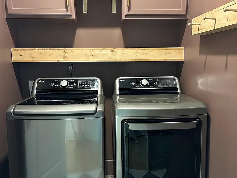 Laundry room. Main level, next to primary bedroom.