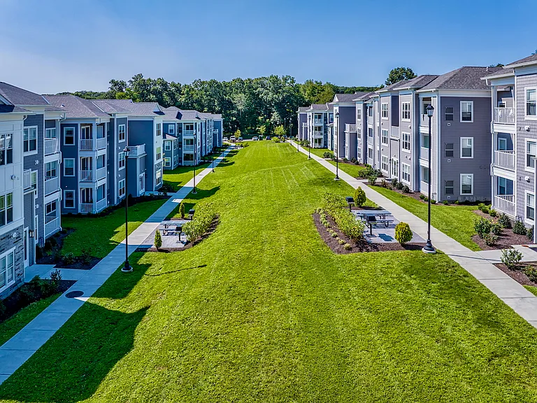 Open space lawns and patios with grills.