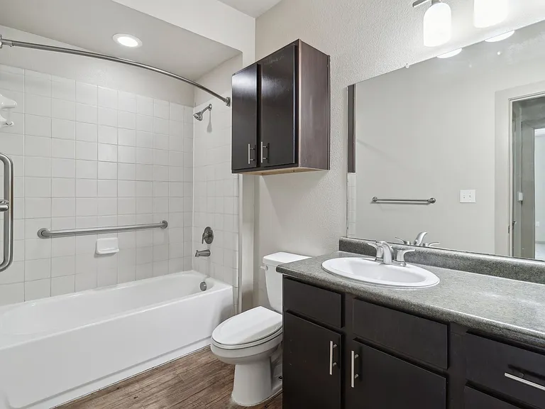 Spacious Bathroom with Tub at District Medical Center, San Antonio