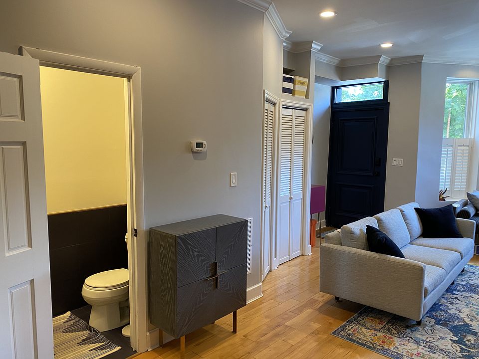 Front living room and downstairs powder room.