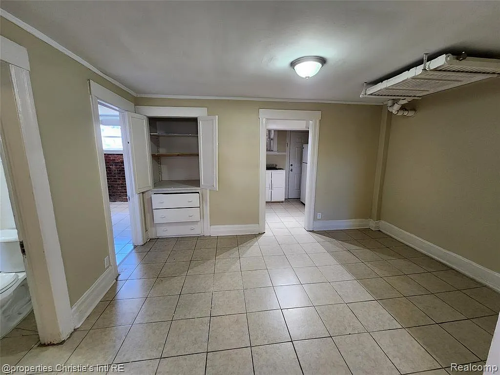 Building Photo - 1535 W Canfield St #7