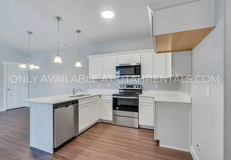 13537 S Commodus Dr #F303 — Photo 1