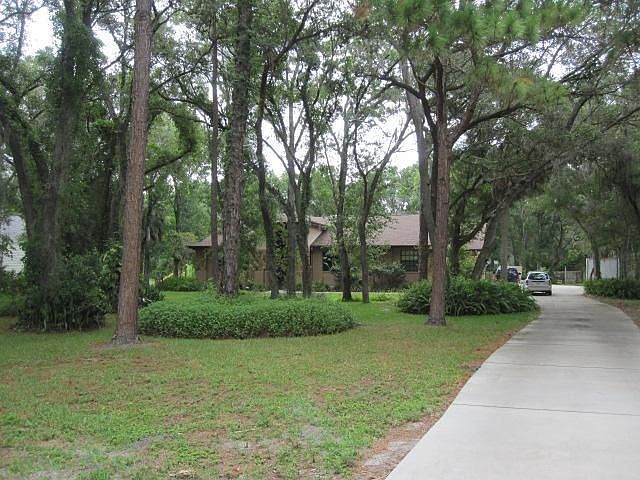 Front view of house and yard
