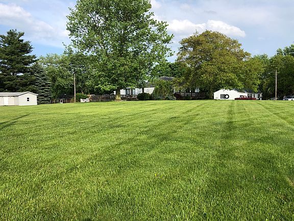 Two lots with playhouse
