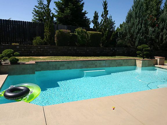 Waterfall with bench on back