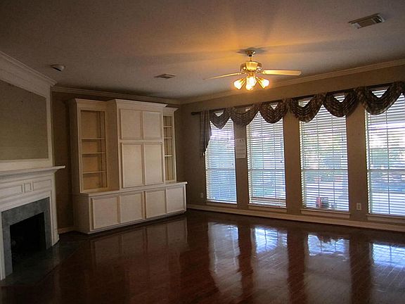 Solid wood floor in family room, and overlook the wonderful water view and swimming pool /spa