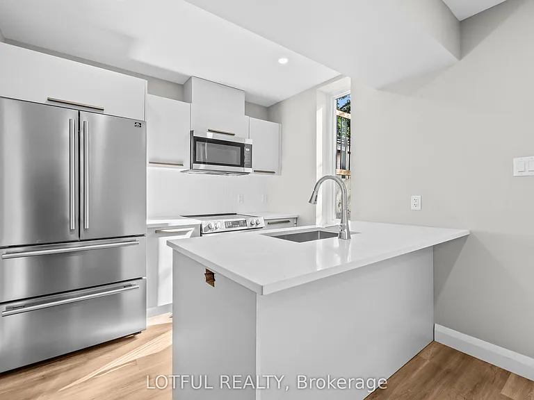 516 Tweedsmuir Ave W #A — Photo 6