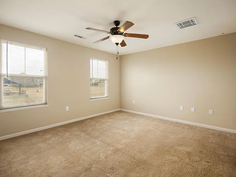 Upstairs spacious primary bedroom.