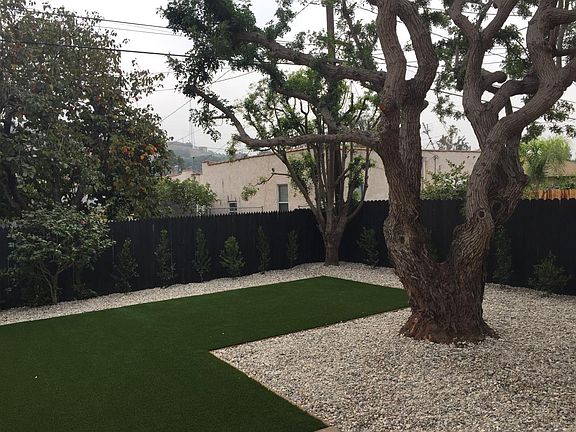 Private fenced in backyard