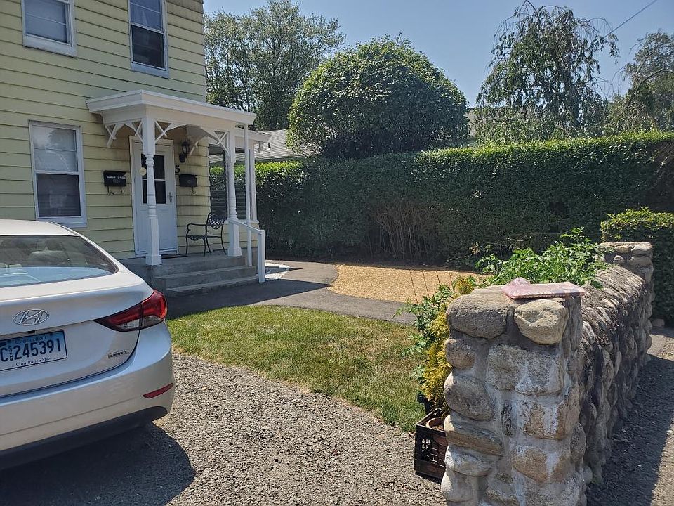front yard, (hayed area is new grass coming in)