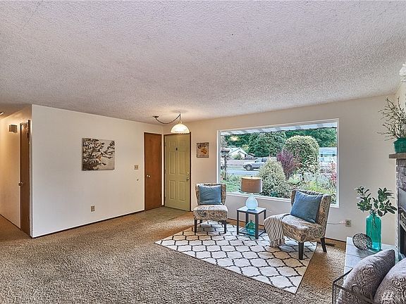 Home enters into a light filled living room