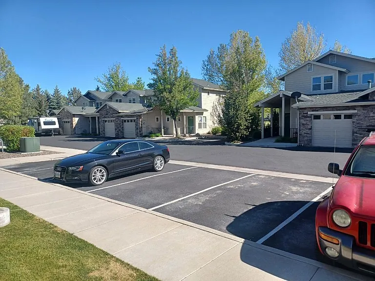 Large unassigned parking for 2nd car