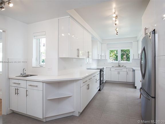Updated immaculate bright Kitchen includes convenient veggie sink