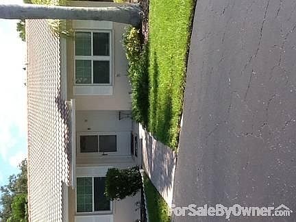 Front
						:
						What you don't see is the side yard and huge royal palm in front yard.