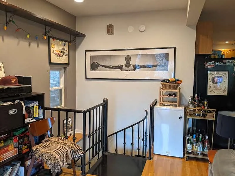 spiral staircase down to 2 bedrooms, bathroom and laundry