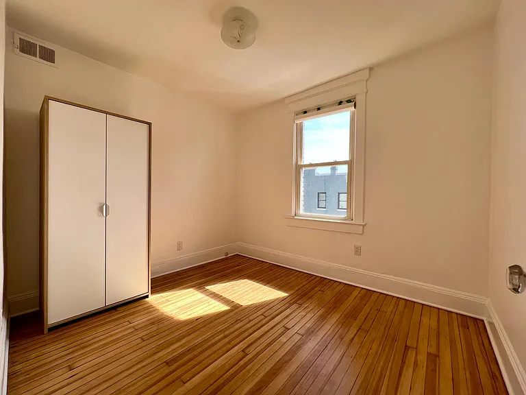 2nd bedroom with armoir