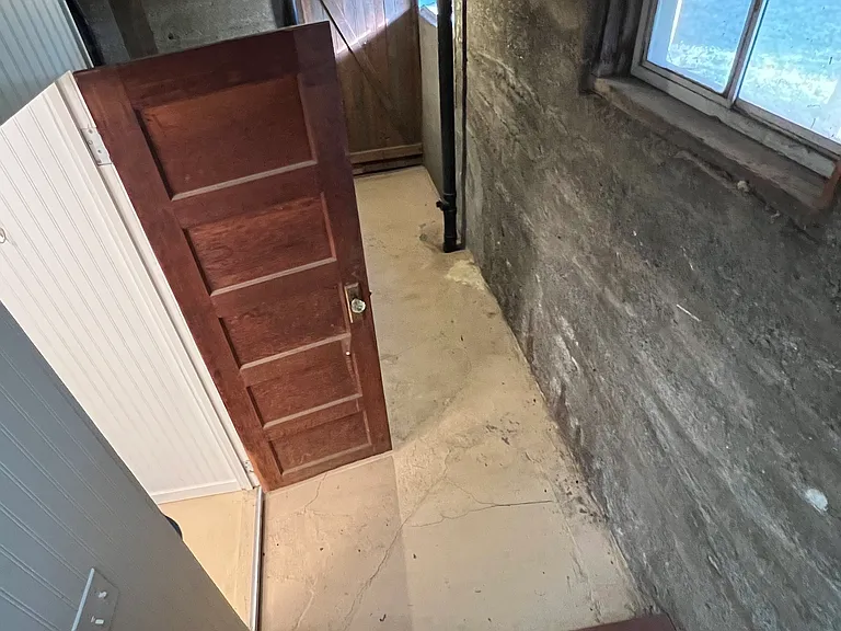 The second bedroom is in the basement. There is also a lot of storage in the basement (uninsulated, cement floor)