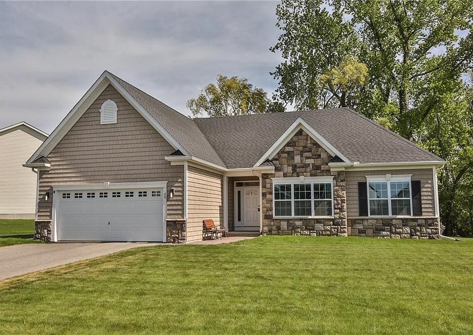 Welcome home to 24 Sedgley Park! Shaker Singles, stone, higher ceilings, stamp concrete walkway, Aztec deck, it's all here!