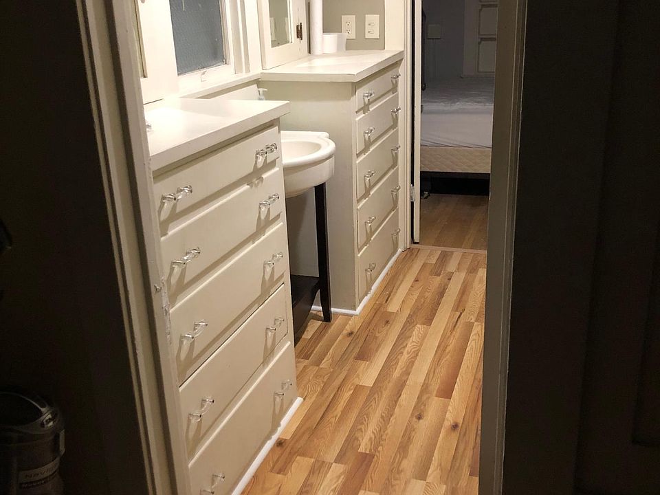 Newly updated bathroom. New sink, new faucet, new tile, new flooring, new tub with ceramic tile. Amazing built in storage units--110 year old orginals