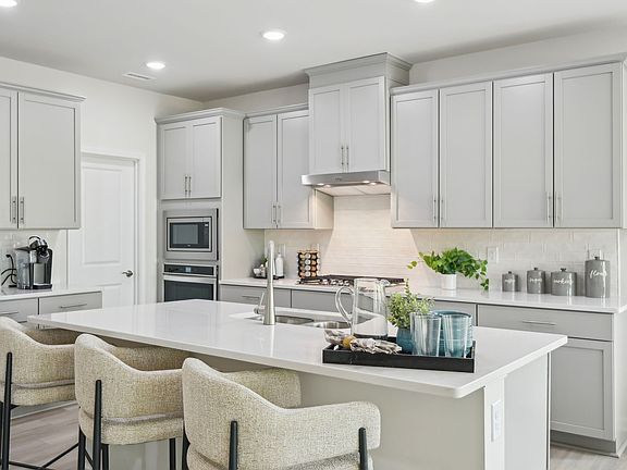 Kitchen in the Sherwood floorplan at Oak Manor in Garner, NC.