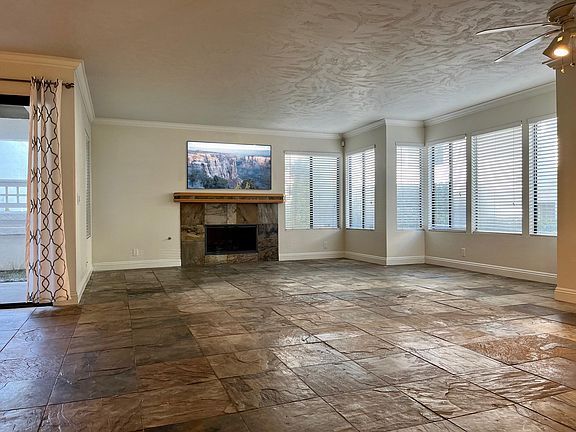 Large windows and patio off the living area.