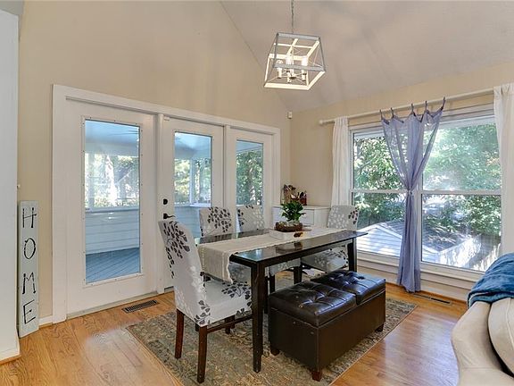 Dining area with access to sun porch.