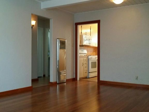 Main room view from windows - yes, the wall heater is vintage chrome and really puts out the heat!