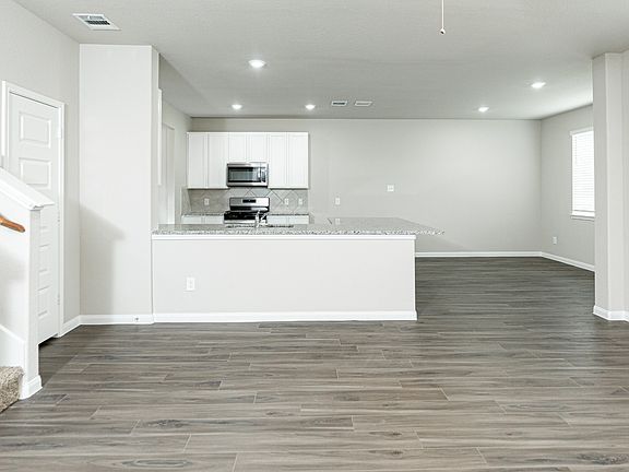 Family Room to Kitchen and Dining Area