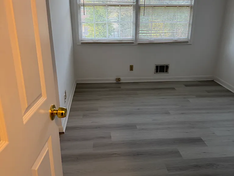 another view of 1st bedroom on the rght