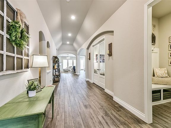 Formal Dining Room Boasts Abundant Natural Light and is Conveniently Situated Off the Entry Hall.