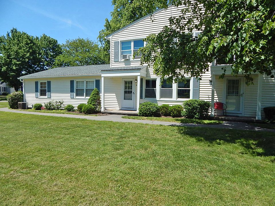 Front door faces scenic creek with green space