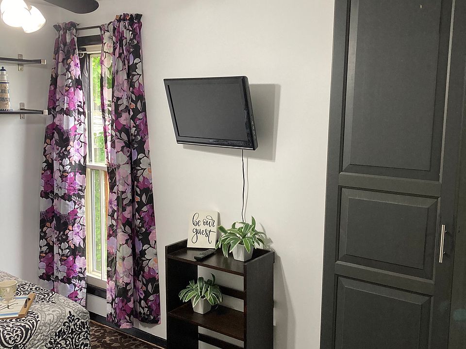 Bright, room with Wall TV included.