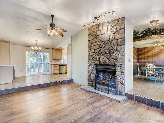 Real wood fire place is the center of attraction.  Home has a nice open floor plan.