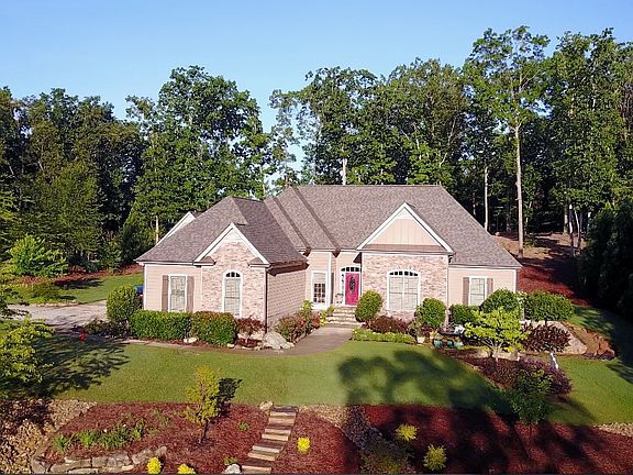 2 Gorgeous Landscaped Acres.