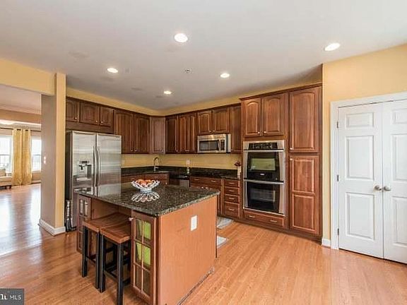 Double door pantry stores everything you need to put together delicious cuisine!