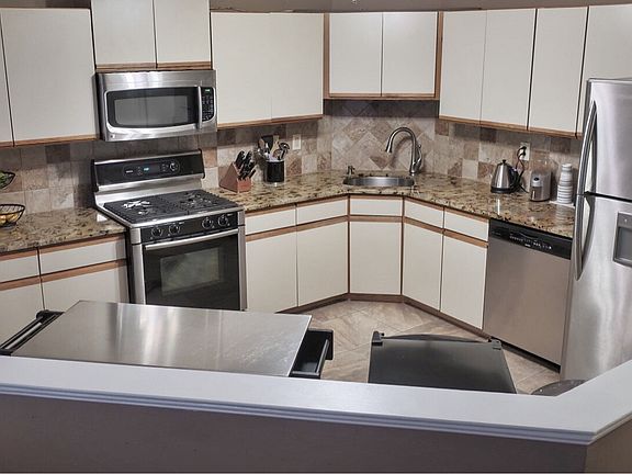 Kitchen with SS appliances