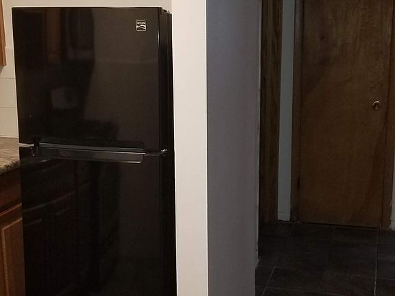 door on left is for bathroom, door straight ahead is for closet